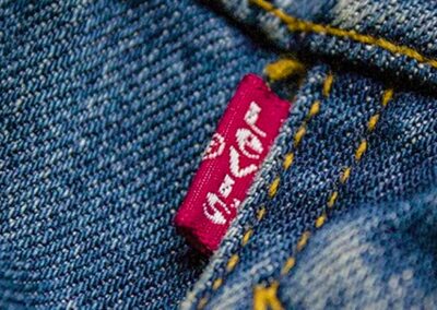 Recycled red tab made for Levi's by Avery Dennison, product development handled by Dumonk co-founder "Three Tales"